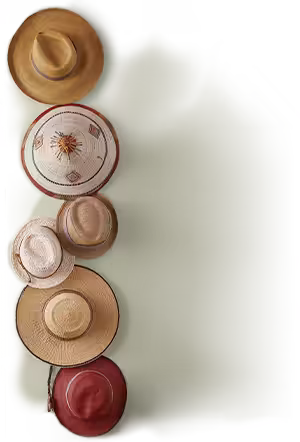 various hats stacked vertically