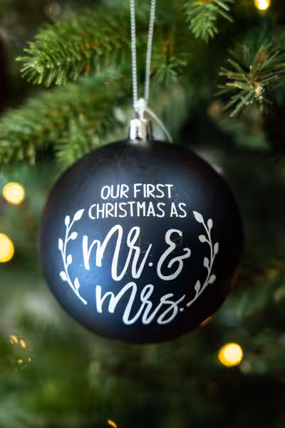 black custom christmas ornament with words mr & mrs first christmas
