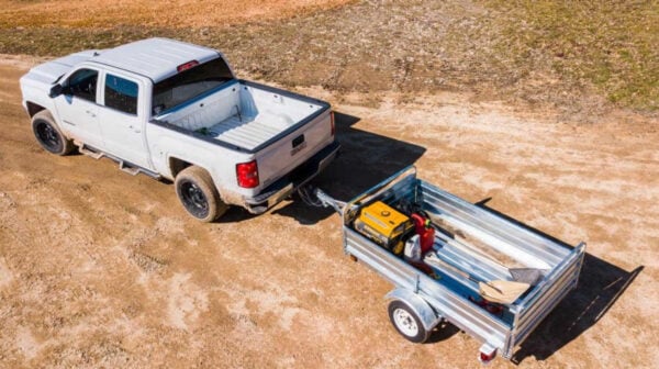 overhead view of dk2 mmt5x7g galvanized utility trailer hitched to pickup truck