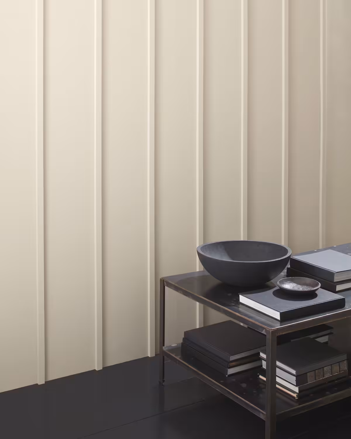 benjamin moore elmira white colour painted on wall with small table in front.