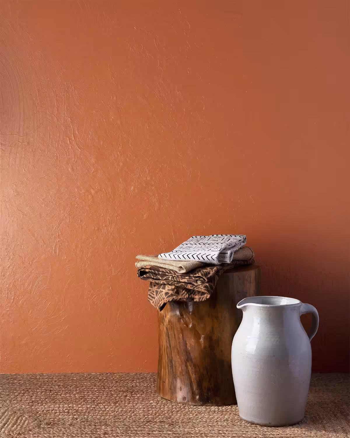 wall painted with benjamin moore's topaz colour against dark wooden floor